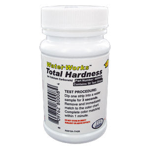 Water hardness test strips used to check whether a portable RV water softener is producing soft water